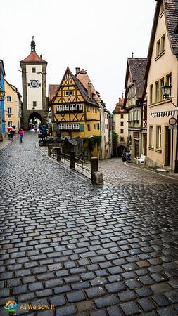 Portrait version of the iconic Rothenburg, Germany Kobolzeller Steige and Spitalgasse street conjunction