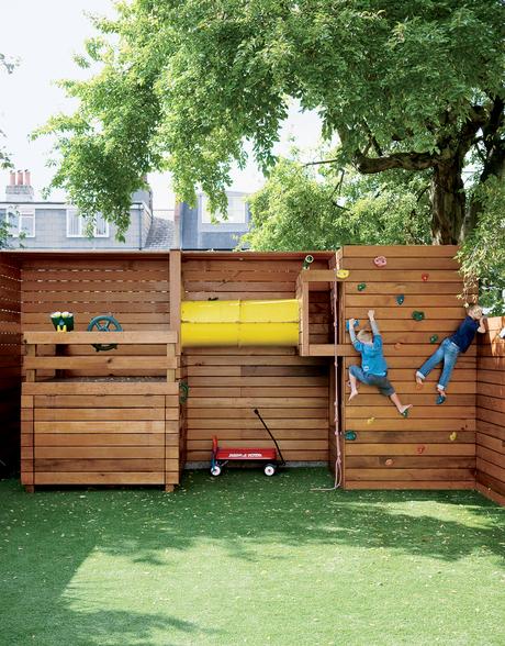 If tidiness is paramount for the family, a place for the kids to play outdoors is equally important. The climbing wall at the back of the garden is entirely the work of Mark Tiarks, who built the Composite House and who relished a chance to step out from 