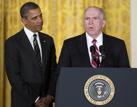 Barack Obama (l) and John Brennan (r) Photo by Joshua Roberts/Bloomberg via Getty Images