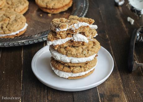 These Peanut Butter Oatmeal Sandwich Cookies with Marshmallow Creme Filling are reminiscent of Little Debbie's Oatmeal Creme Pies with their super soft texture and creme filling - but they have a peanut butter twist!
