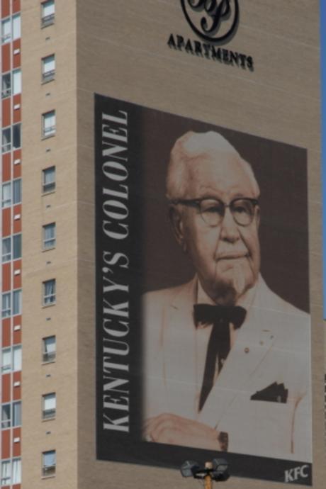 Louisville is so proud of the Colonel they put him on the side of a building so people in downtown traffic jams might gaze upon his works and not despair.