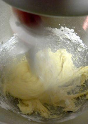 Alfajores - Add flour to the wet ingredients
