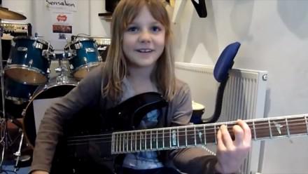 Eight-year-girl guitar playing schoolgirl absolutely smashes Stratovarius’s Stratosphere