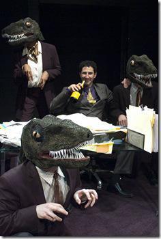 Sean Fortunato as Andrew Fastow, with his “raptors” (from left: Demetria Thomas, Benjamin Sprunger and Matt Holzfeind) in the Chicago premiere of ENRON by Lucy Prebble, directed by Rachel Rockwell