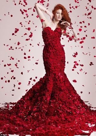 Dress of roses.
Just on time for the Valentines day Weekend, Asda (Walmart) have commissioned award winning florist: Joe Massie, to create a stunning gown made entirely from red roses. 
What a stunning piece, it has to be said. Looking like a piece of Paris Haute couture, the dress brakes the mold of the typical Asda image and is sure to get guys ready to part with there cash. 
xoxo LLM