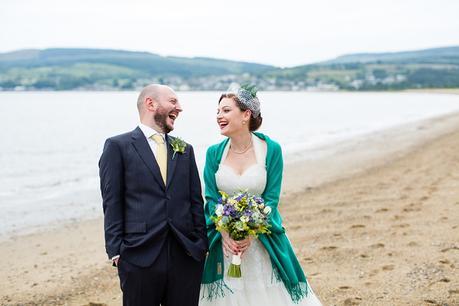 Isle of Arran wedding photography beach portraits of bride & groom relaxed & fun