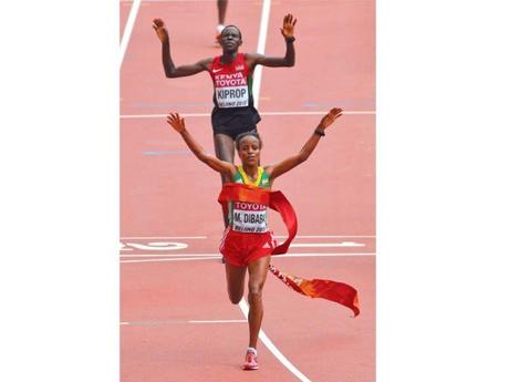 Mare Diababa wins Women's marathon ~the twins on the field !
