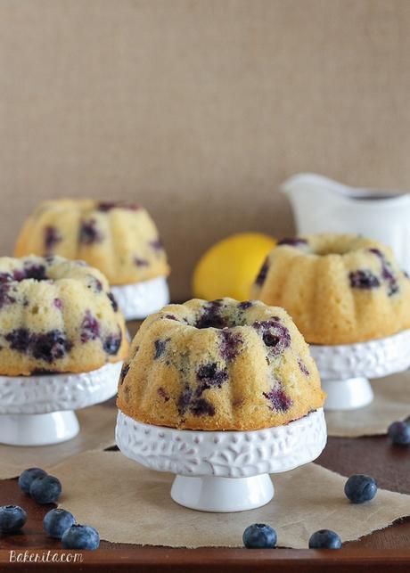 These Mini Lemon Blueberry Bundt Cakes are dripping with fruity blueberry glaze. These mini cakes are small enough so that no one has to share!