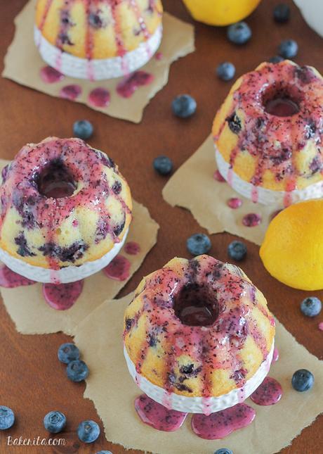 These Mini Lemon Blueberry Bundt Cakes are dripping with fruity blueberry glaze. These mini cakes are small enough so that no one has to share!