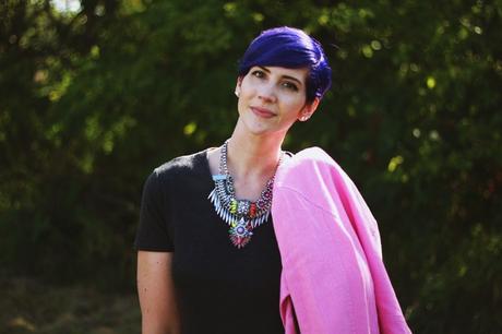 Outfit details: purple pixie haircut, layered statement necklaces
