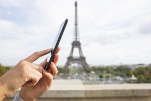 Close up of hands Female mobile phone Paris message sms e-mail