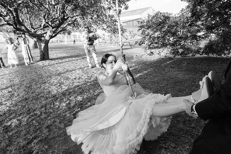Barmbyfield Barn wedding photography swinging on swing