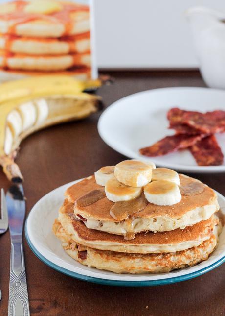 These Elvis Pancakes are banana peanut butter pancakes stuffed with peanut butter and bacon. These are the ultimate breakfast treat - made with only 4 ingredients!