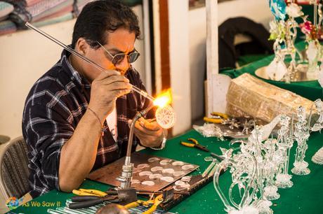 Glass maker at work.