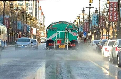 China: These water trucks are everywhere in Xi'an. It's so dusty they are constantly washing the roads cruising the streets to the tune 