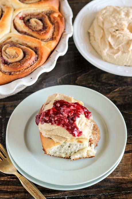 These Peanut Butter & Jelly Cinnamon Rolls are a delicious twist on a classic breakfast treat. These cinnamon rolls are filled with peanut butter and jelly and topped with a peanut butter cream cheese frosting. This will be the best PB&J you've ever had!