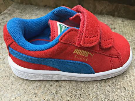 Get the Label red Puma kids trainers side view
