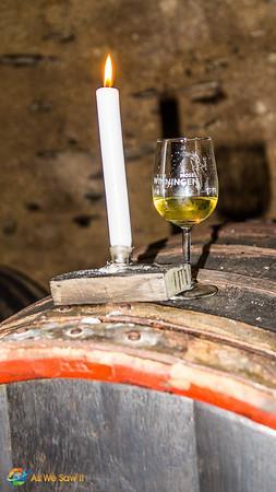 Enjoying wine in a basement wine cellar