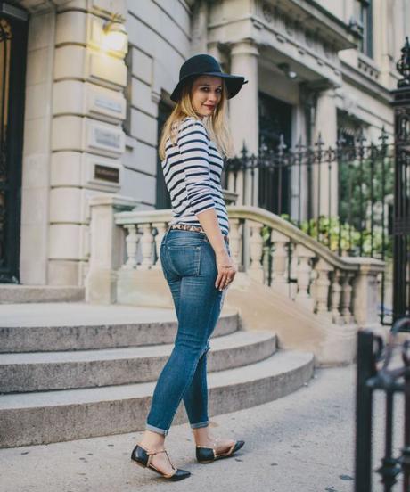 Shian Knuth wearing striped Gap tee, white manicure, and leopard print belt,.