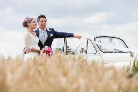 Barmbyfield Barn Wedding Photographer Bride and groom portraits in barley field