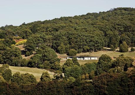 Sloping landscape of low-slung house by Kerstin Thompson Architects.