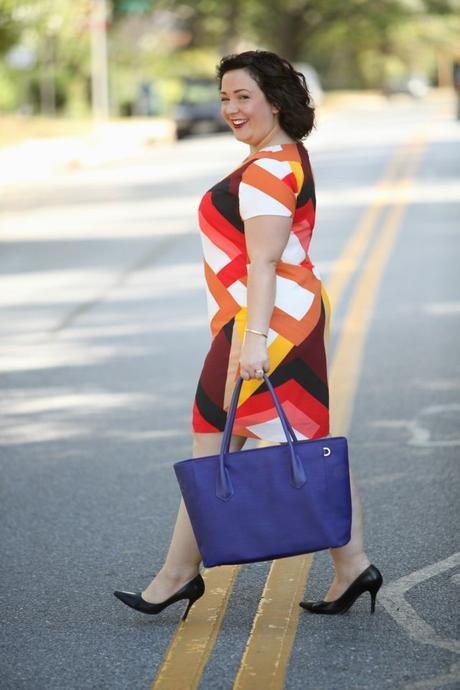 Wardrobe Oxygen wearing a Vince Camuto shift dress and Dagne Dover tote