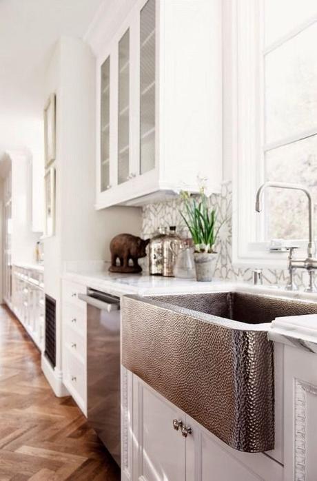 white kitchen with copper sink