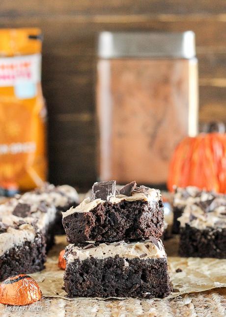 These Pumpkin Spice Latte Brownies are homemade pumpkin brownies infused with coffee and topped with a whipped pumpkin spice latte frosting.