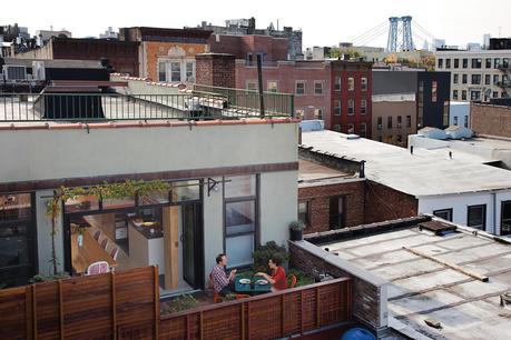 Outdoor fenced dining porch area in Brooklyn, New York
