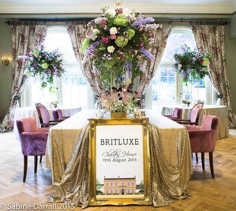 Brit lux illustrated venue welcome sign and floral display