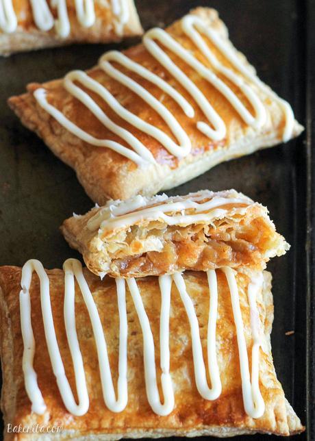 These Caramel Apple Toaster Strudel are a homemade twist on your childhood favorite! With a sticky sweet caramel apple filling and a cream cheese glaze, these are an upgrade on the classic.
