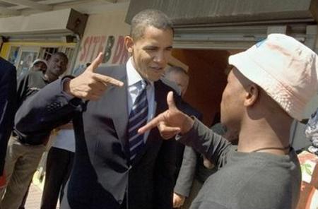 Obama makes gun gesture