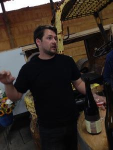 Kris Mathewson, wine maker at Bellwether, pours out his all-star pinot noir.