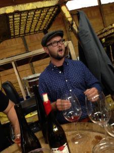 Nate Kendall of Nathan Kendall WInes and winemaker at Bellangelo pours out some FLX pinot noir to WBC15 participants.