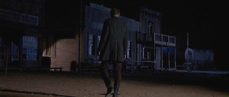Col. Mortimer in For a Few Dollars More Mortimer kindly steps over to pick up his hat.