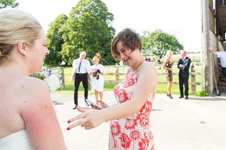 Canidid photographs at barmbyfiled barn wedding 