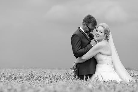 Barmbyfield Barn Wedding Photography couples portraits in field