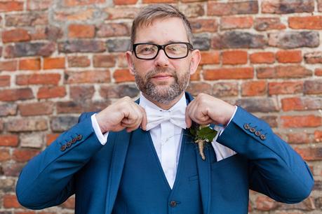 Groom Preparation for Barmbyfield Barn Wedding bow tie