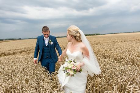 Barmbyfield Barn Wedding Photography couples portraits in field