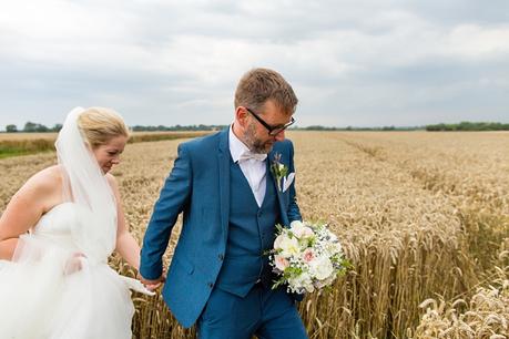 Barmbyfield Barn Wedding Photography couples portraits in field