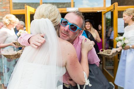 Canidid photographs at barmbyfiled barn wedding 