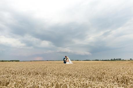 Barmbyfield Barn Wedding Photography couples portraits in field