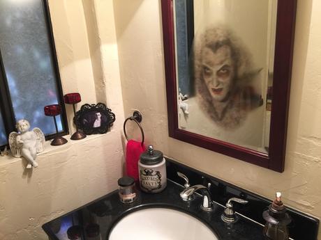 bathroom halloween decoration tips advice how to ideas inspiration dracula mirror candle vanity scary spooky diy