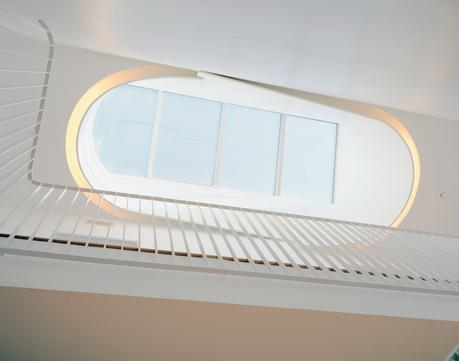 Briggs and Knowles based their design of the oculus on traditional Victorian skylights but tweaked it to fit a more modern sensibility and outfitted it with fluorescent tubing to recreate the effect in the evening.