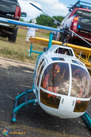This model helicopter at the Panama International Air Show comes equipped with toy doll pilots.