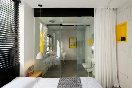 Tiny Tel Aviv Apartment glass walls separating spaces