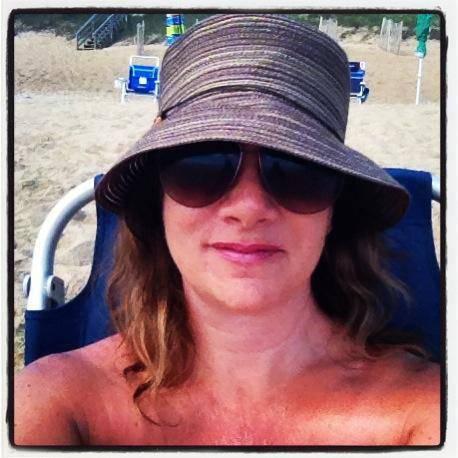 My brown and tan floppy beach hat.