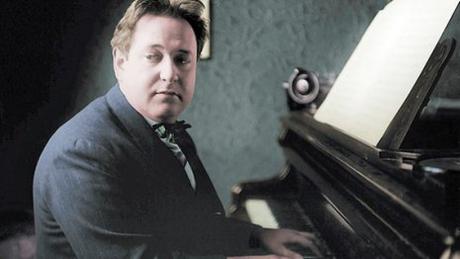 Erich Wolfgang Korngold, composer of the score