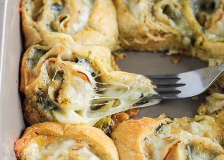 These Cheesy Turkey Pesto Rolls make a great snack or appetizer perfect for tailgating or the holidays! Gooey mozzarella makes this easy four ingredient recipe absolutely irresistible.