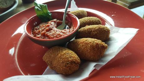 Chicken croquets stuffed with dark olive